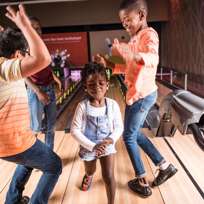 Ed's Bowling birthday party celebration at West Edmonton Mall featuring bowling, arcade games, and food packages.